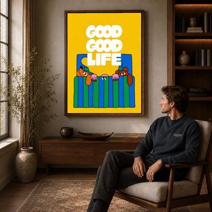 playful bedtime dogs canvas art in a walnut frame above a console beside a seated man.
