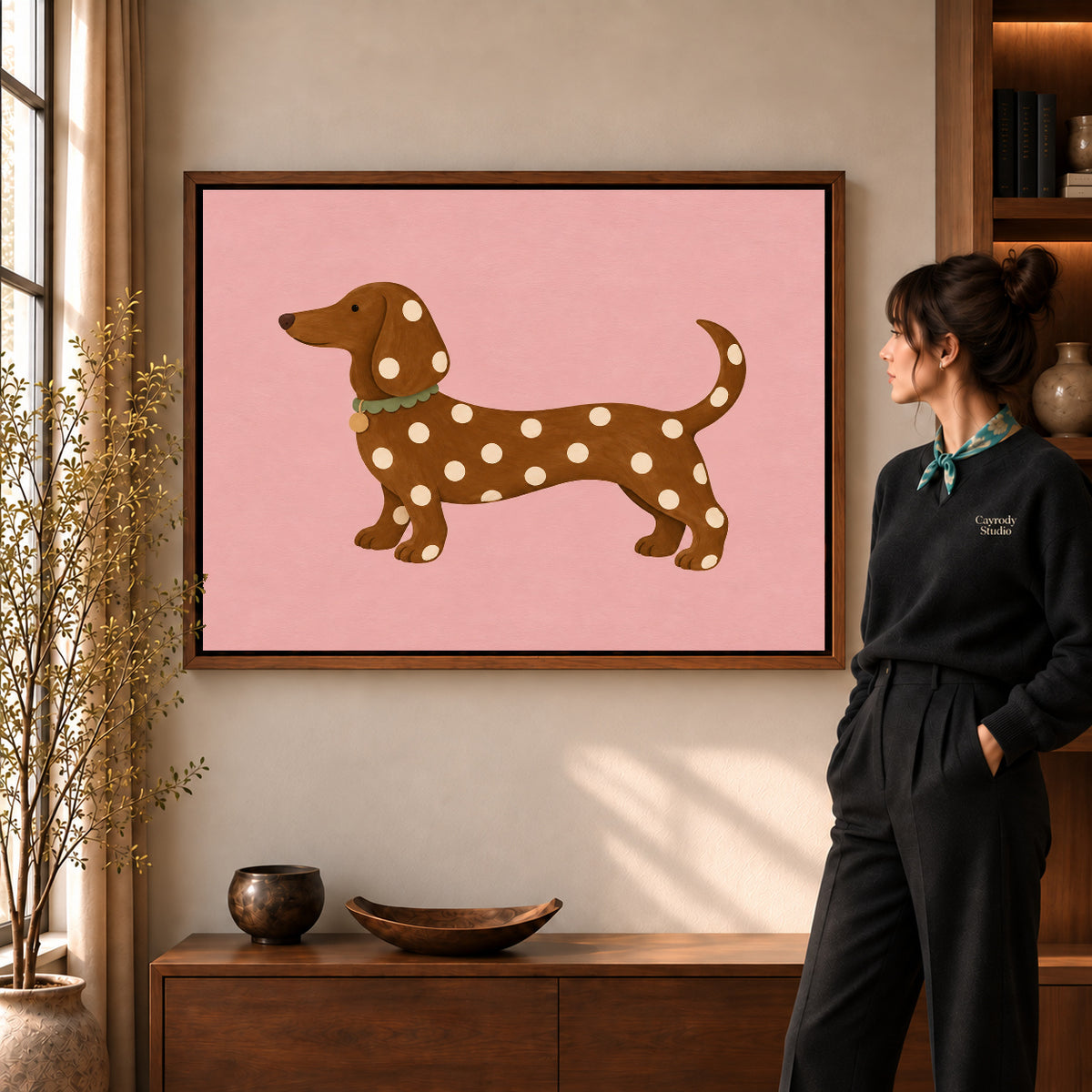 polka dot dachshund canvas art shown in the walnut frame option within a warm living room.