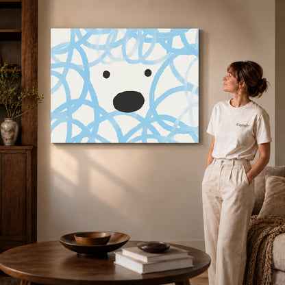 playful curly dog canvas art on gallery-wrapped canvas with visible edge depth beside a standing woman.