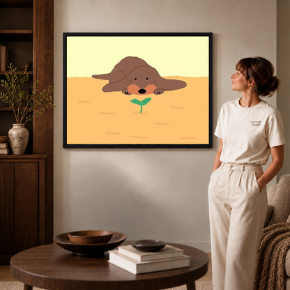 gentle puppy sprout canvas art in a black frame beside a woman and round wooden table.