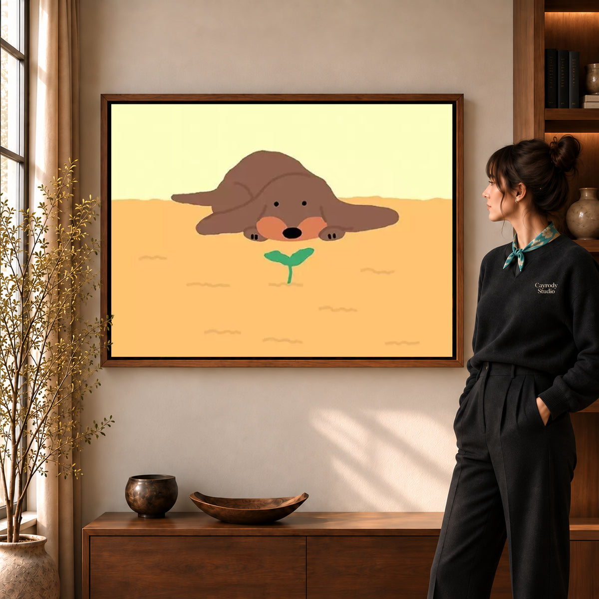 gentle puppy sprout canvas art shown in the walnut frame option within a warm living room.