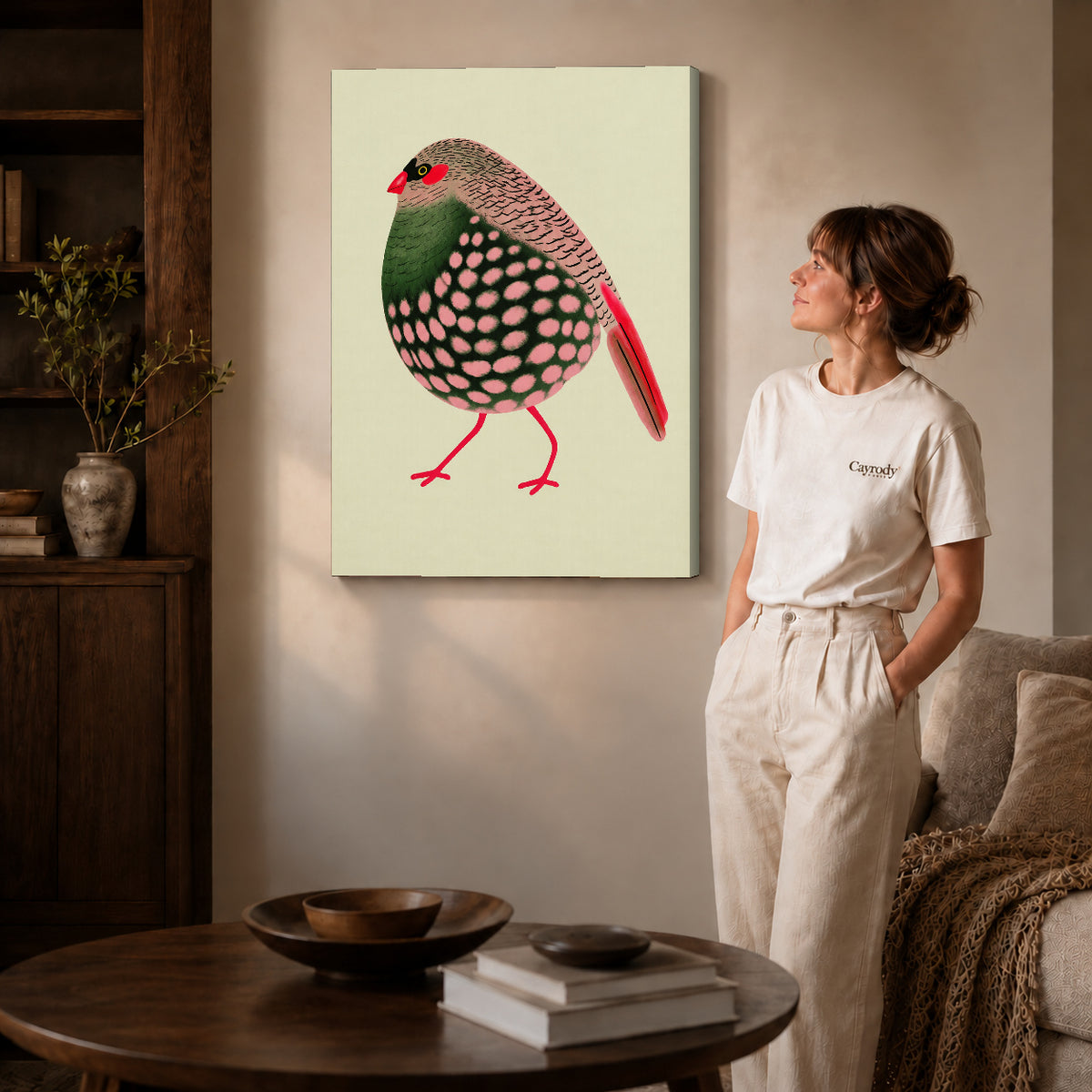 decorative spotted finch canvas art shown in the gallery-wrapped option with visible depth and warm surroundings.