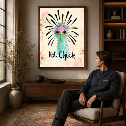 playful hot chick canvas art in a walnut frame above a console beside a seated man.