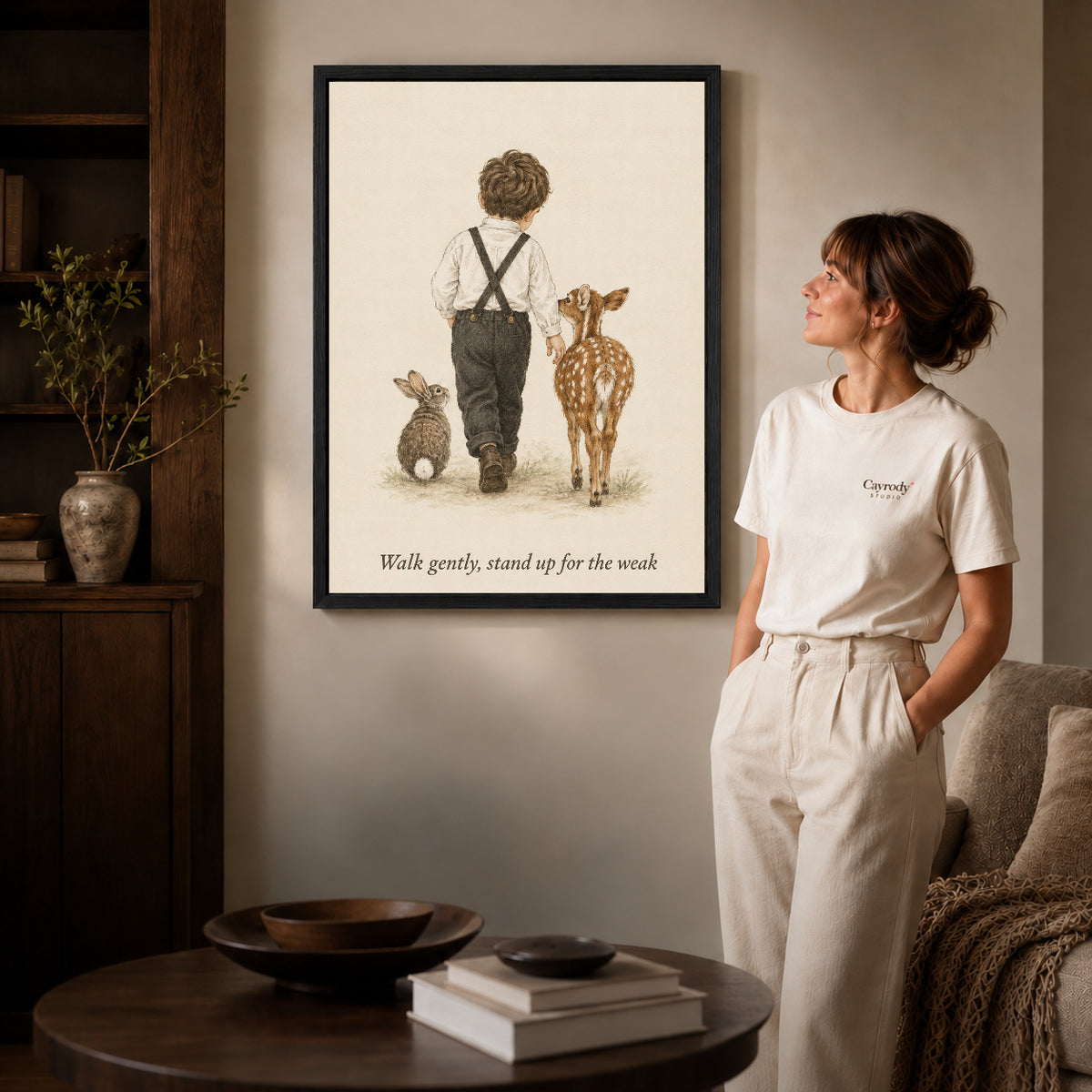 gentle woodland companions canvas art shown in the black frame option against a softly lit wall.