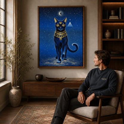 celestial golden cat canvas art in a walnut frame above a console beside a seated man.