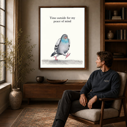 peaceful walking pigeon canvas art in a walnut frame above a console beside a seated man.