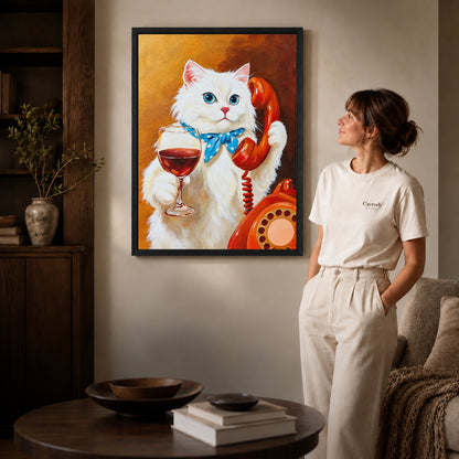 vintage telephone wine cat canvas art in a black frame beside a woman and round wooden table.