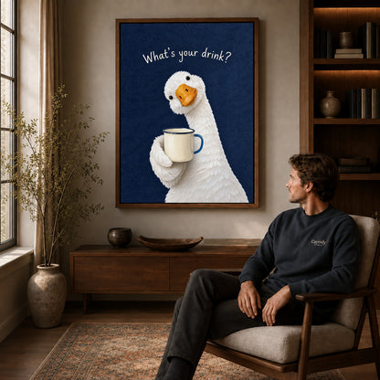 playful coffee duck canvas art in a walnut frame above a console beside a seated man.