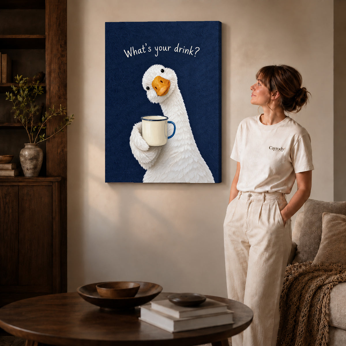 playful coffee duck canvas art on gallery-wrapped canvas with natural edge shading beside a standing woman.