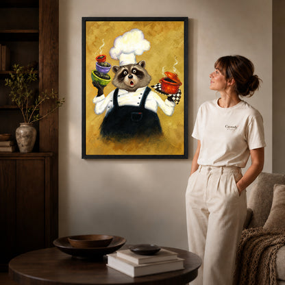 playful raccoon chef canvas art shown in the black frame option against a softly lit wall.