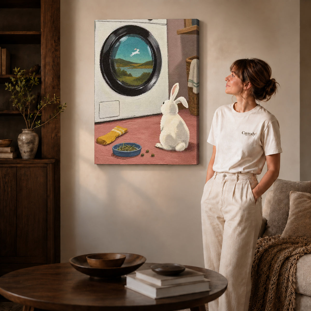 dreamy laundry rabbit canvas art on gallery-wrapped canvas with natural edge shading beside a standing woman.