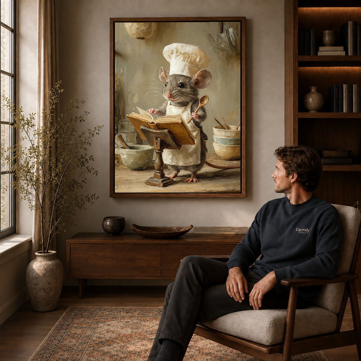 warm recipe mouse canvas art in a walnut frame above a console beside a seated man.