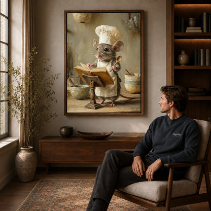 warm recipe mouse canvas art in a walnut frame above a console beside a seated man.