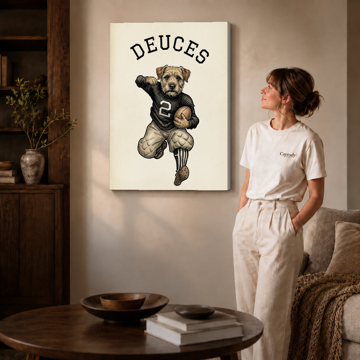 vintage football terrier canvas art on gallery-wrapped canvas with natural edge shading beside a standing woman.
