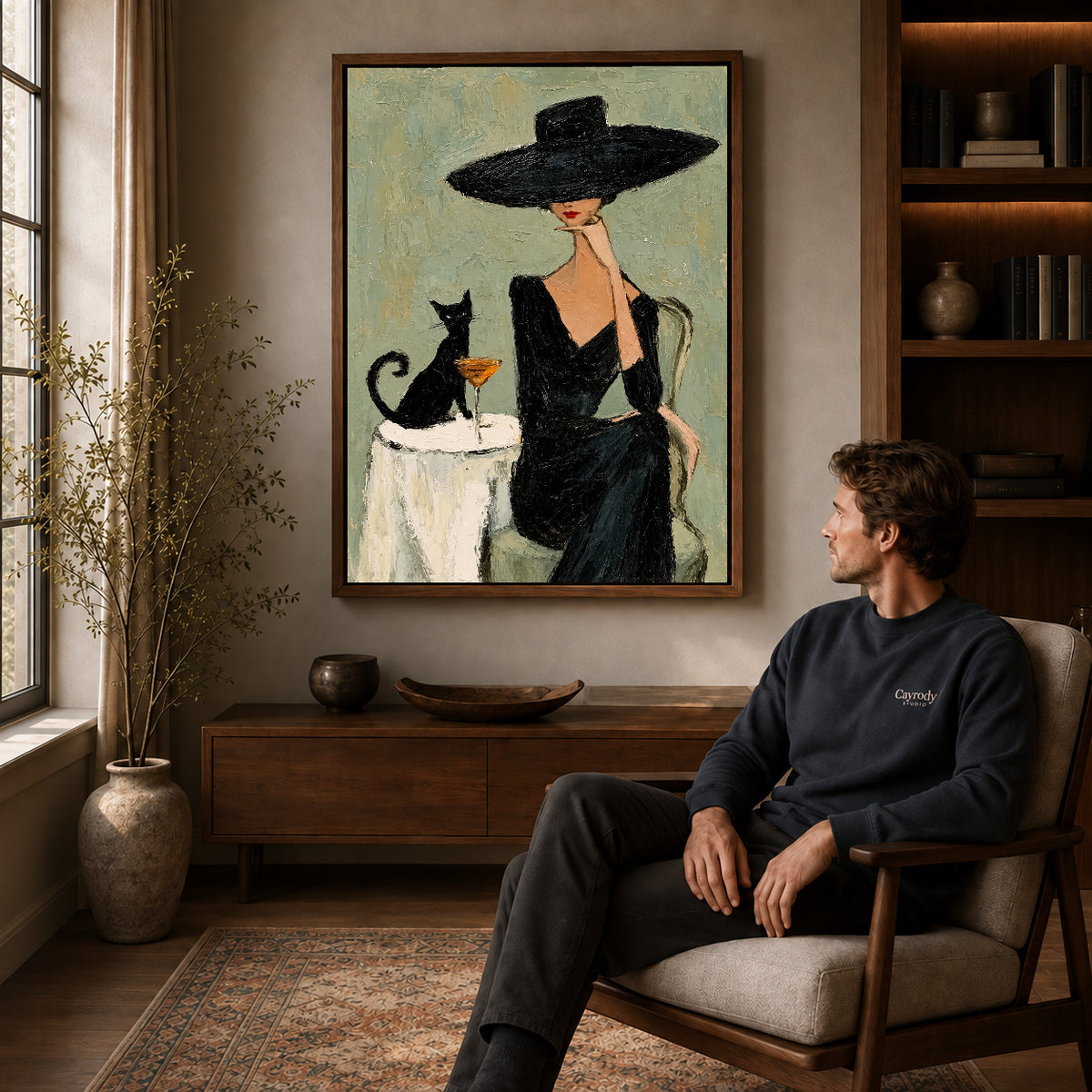 elegant woman cat portrait canvas art in a walnut frame above a console beside a seated man.