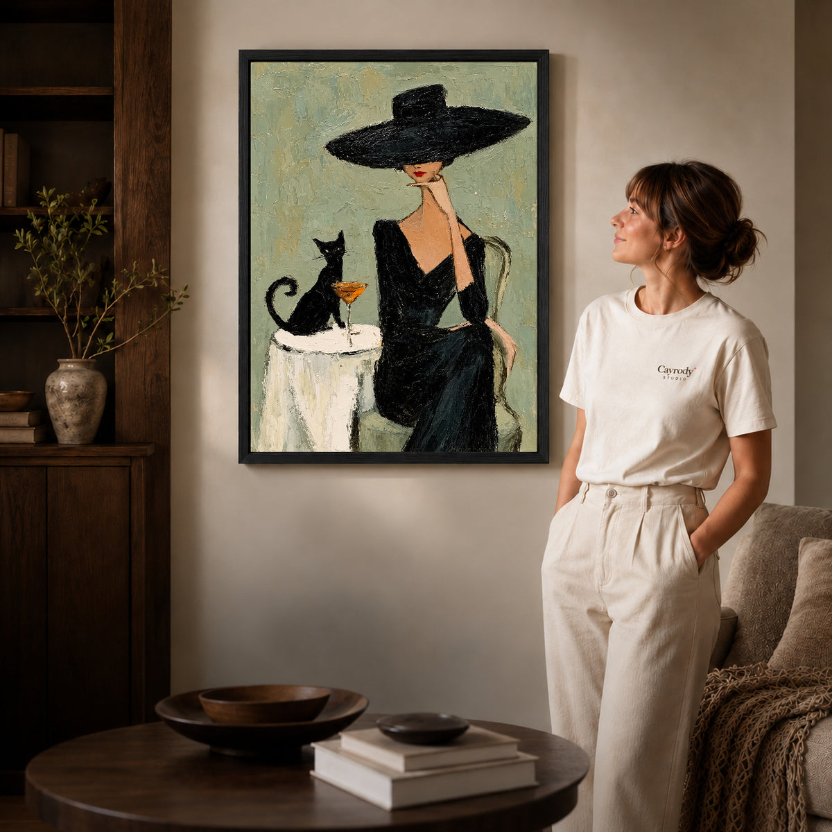 elegant woman cat portrait canvas art shown in the black frame option against a softly lit wall.