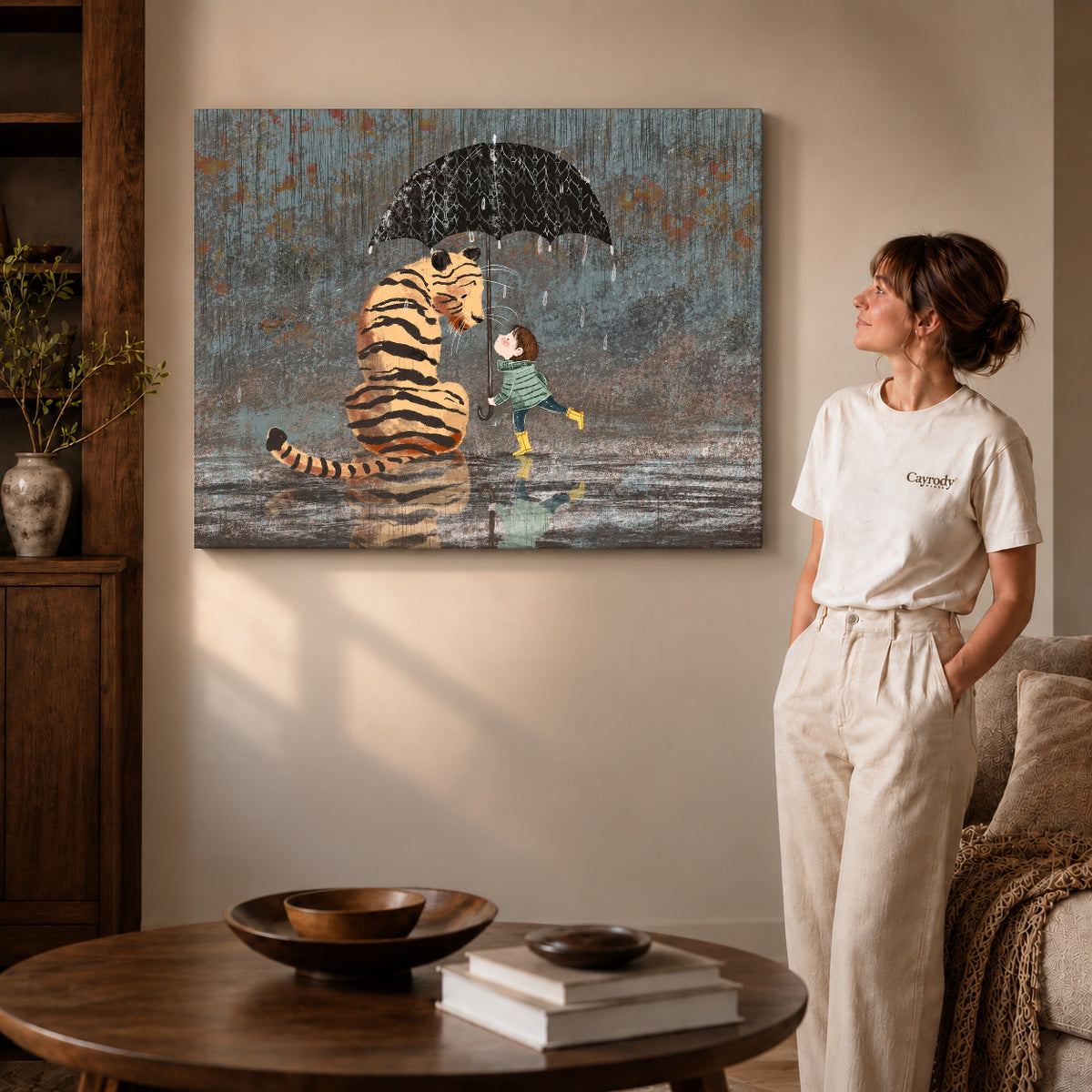 rainy tiger friendship canvas art on gallery-wrapped canvas with visible edge depth beside a standing woman.