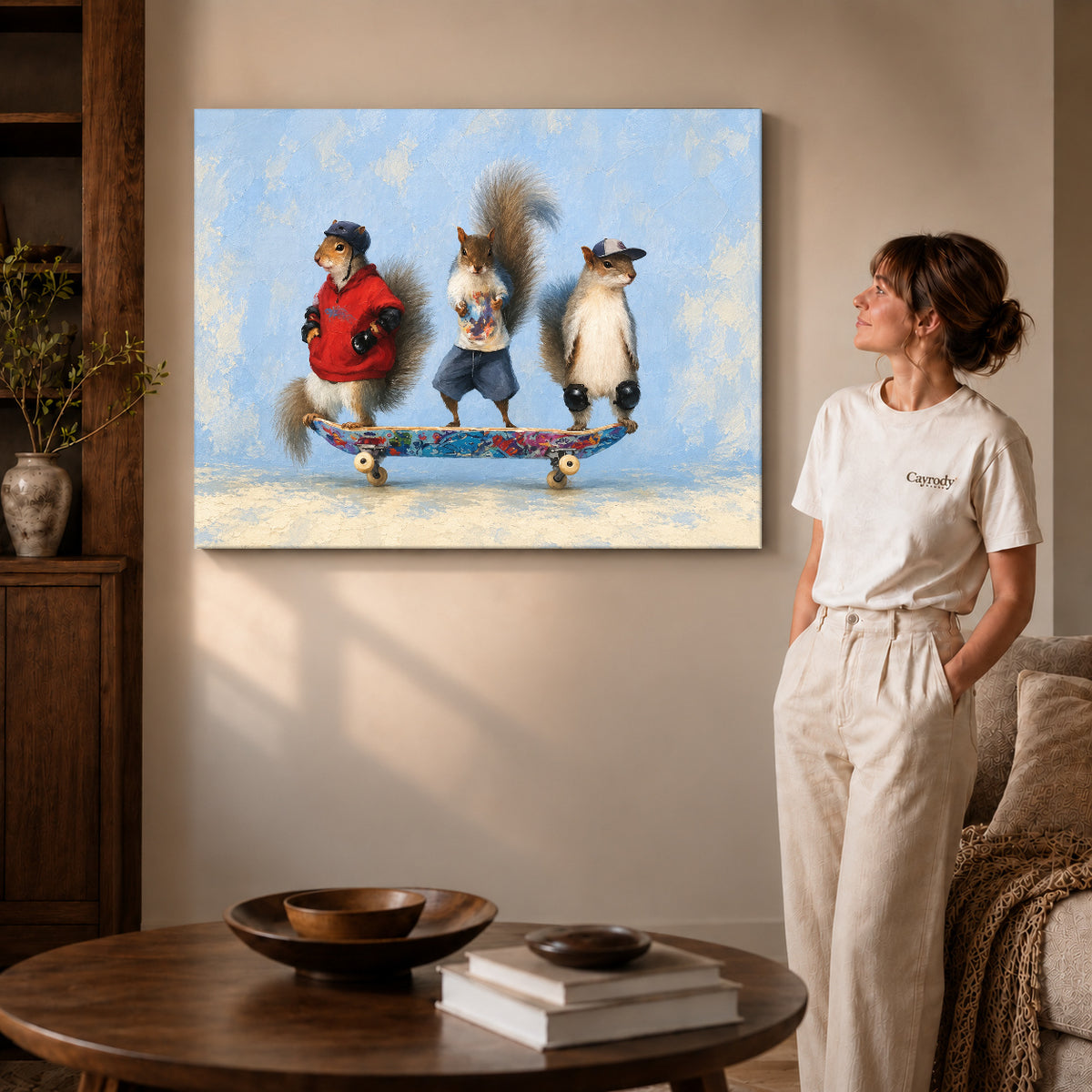 skateboard squirrel trio canvas art on gallery-wrapped canvas with visible edge depth beside a standing woman.