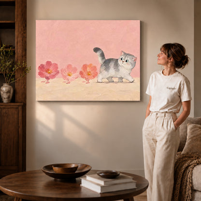 sweet blossom kitten canvas art on gallery-wrapped canvas with visible edge depth beside a standing woman.