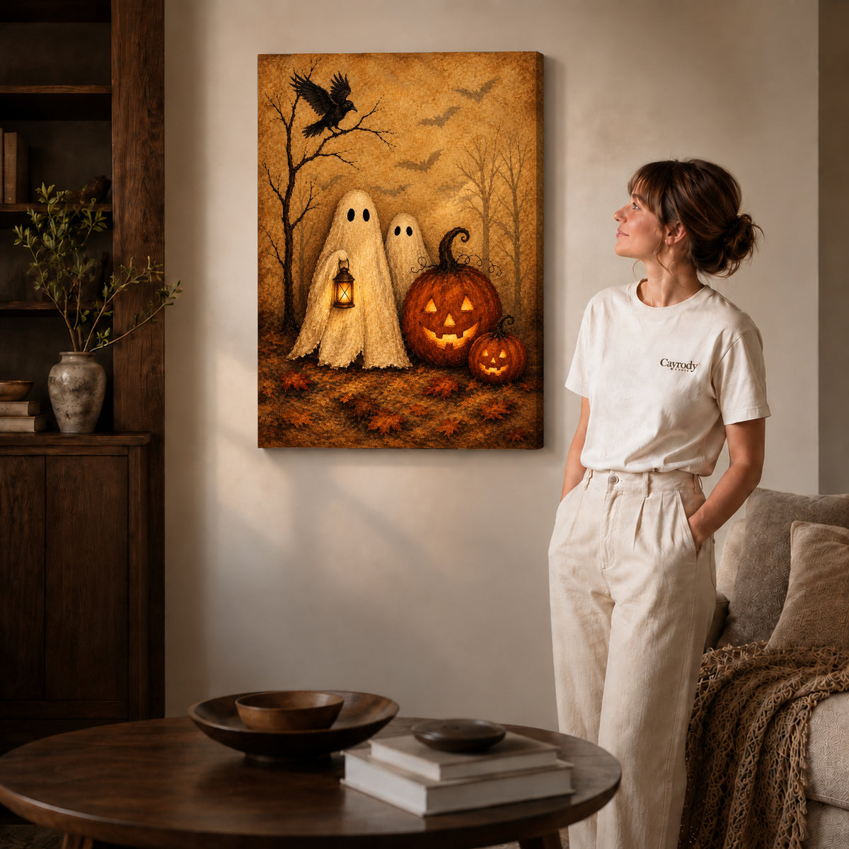 autumn ghost companions canvas art on gallery-wrapped canvas with natural edge shading beside a standing woman.