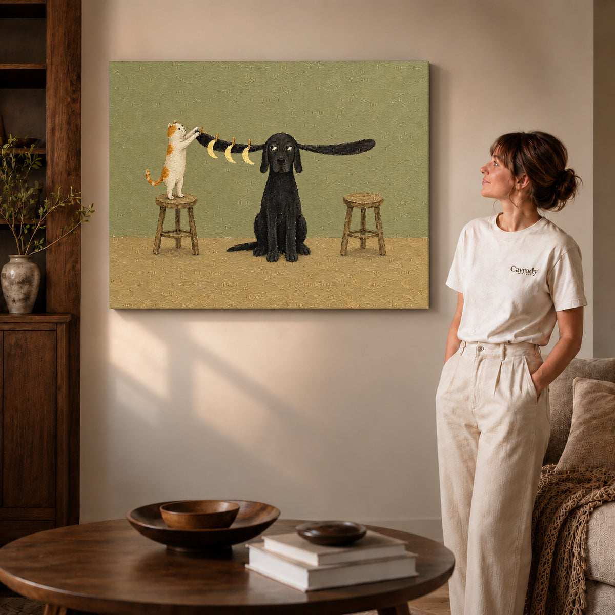 moon hanging pet friends canvas art on gallery-wrapped canvas with visible edge depth beside a standing woman.