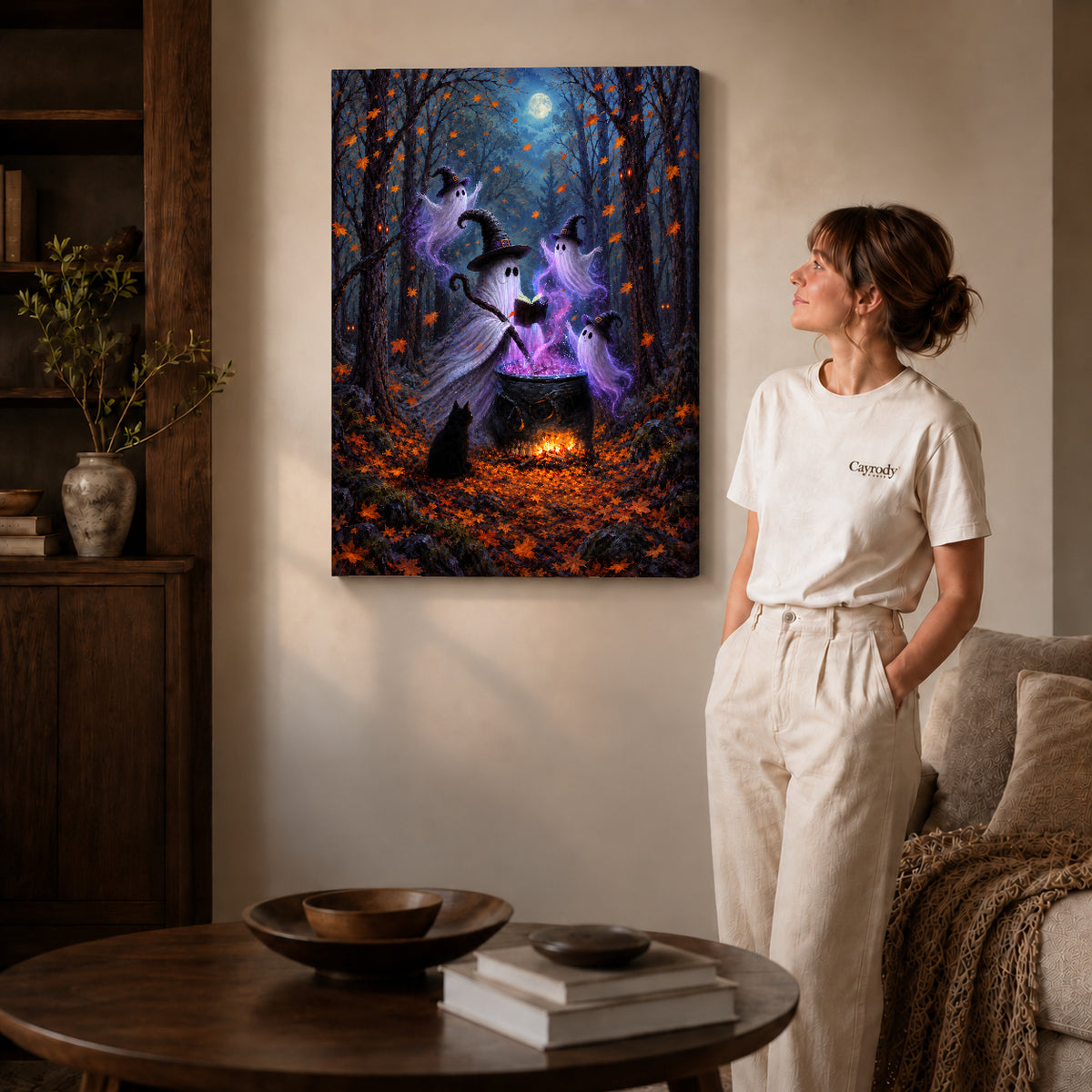 woodland ghost gathering canvas art on gallery-wrapped canvas with natural edge shading beside a standing woman.