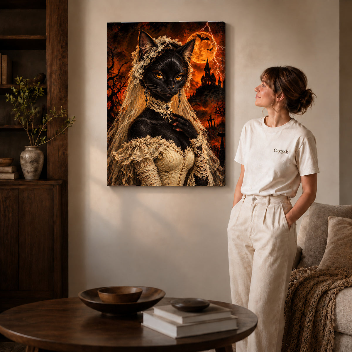gothic lace cat canvas art on gallery-wrapped canvas with natural edge shading beside a standing woman.