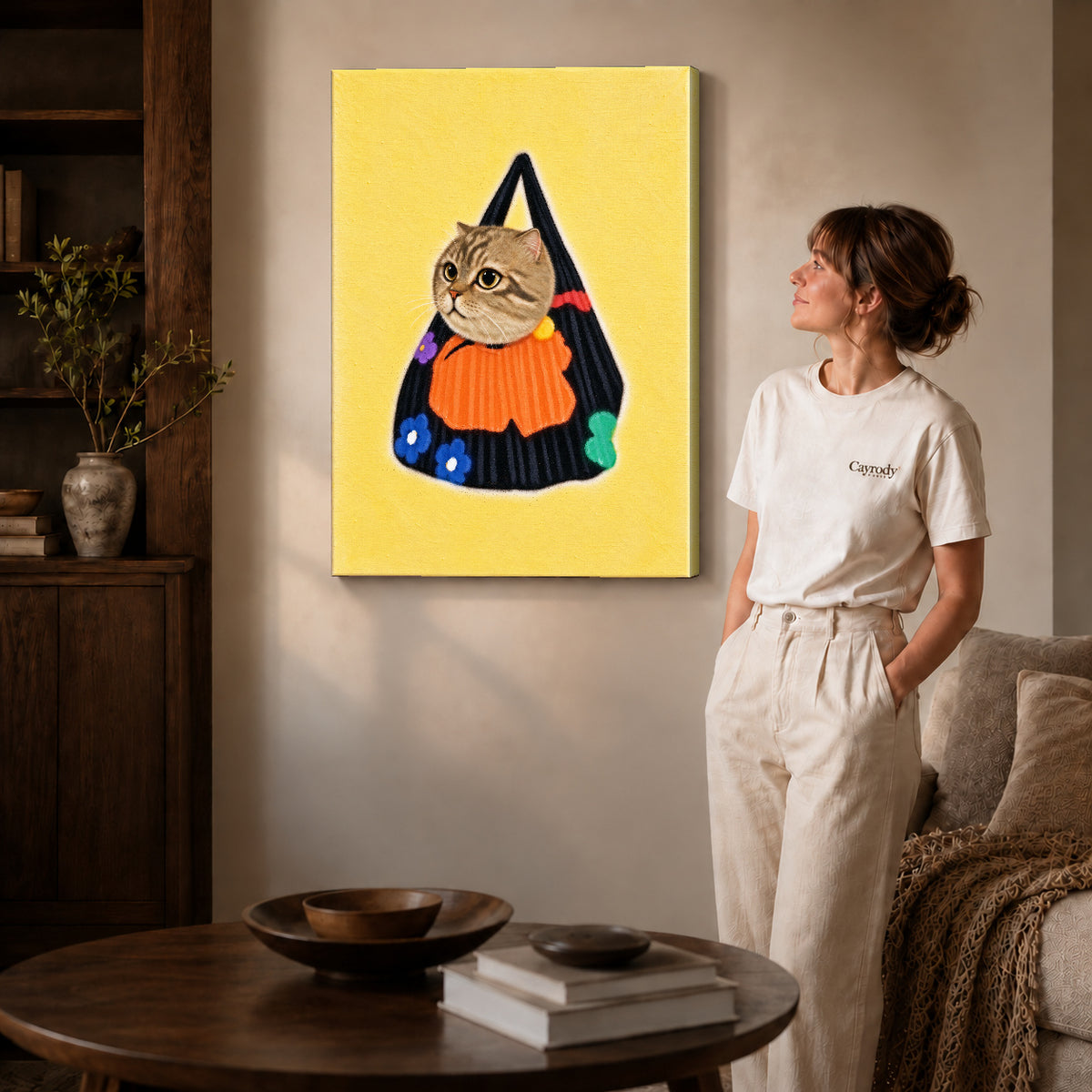 tabby tote companion canvas art on gallery-wrapped canvas with natural edge shading beside a standing woman.