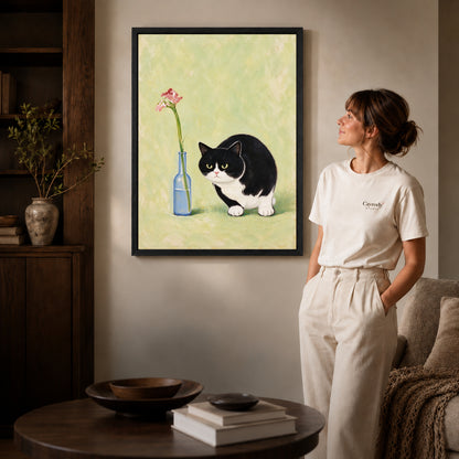 cat flower companion canvas art shown in the black frame option against a softly lit wall.