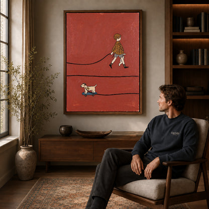 skateboard dog walk canvas art in a walnut frame above a console beside a seated man.