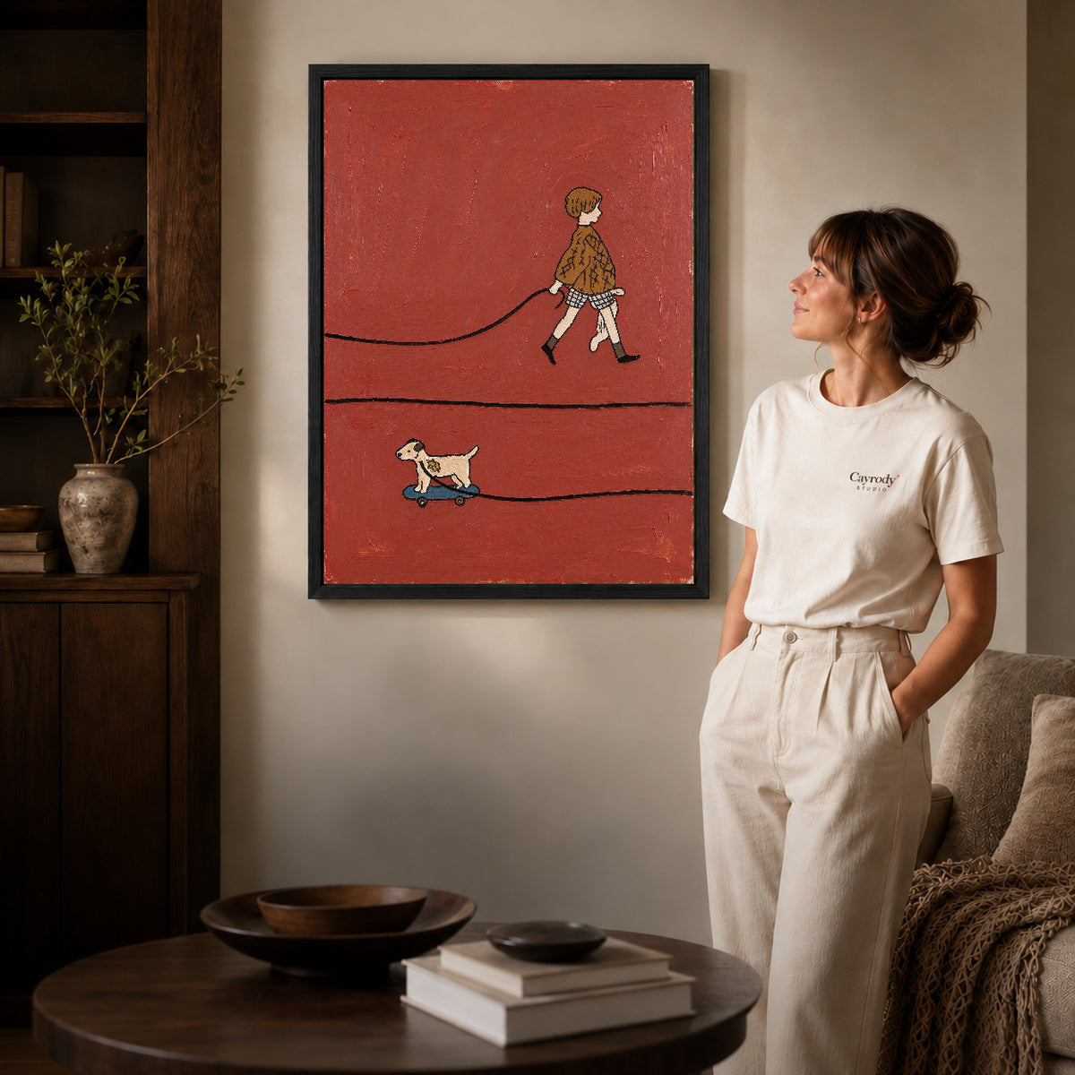 skateboard dog walk canvas art shown in the black frame option against a softly lit wall.