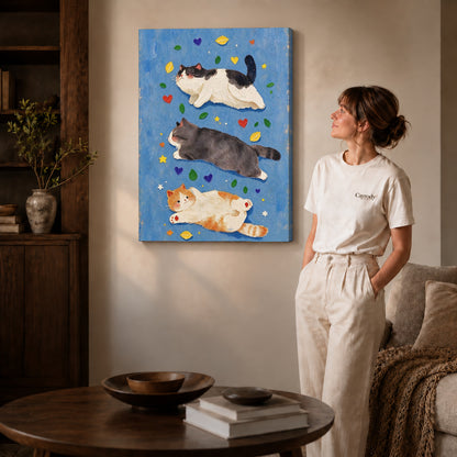 three resting cats canvas art on gallery-wrapped canvas with natural edge shading beside a standing woman.