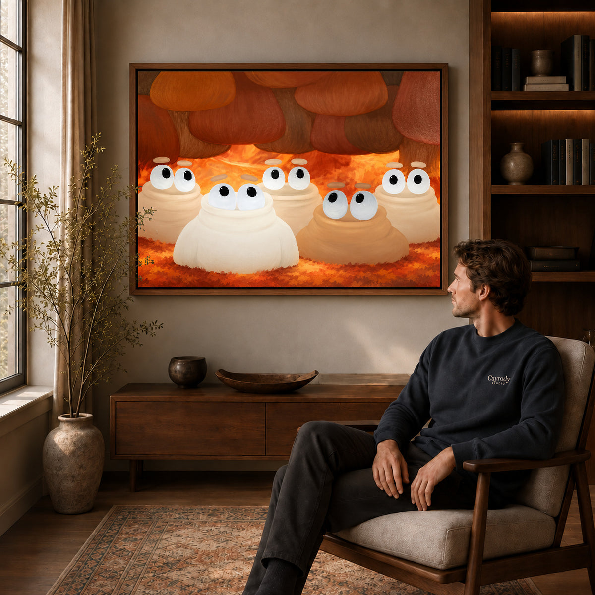 curious woodland friends canvas art in a walnut frame above a console beside a seated man.