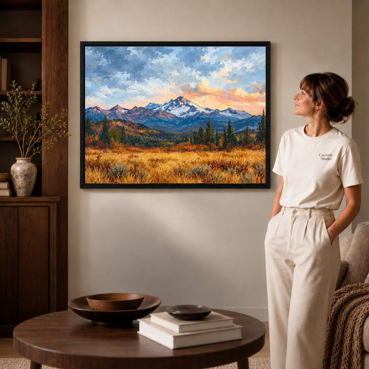 golden mountain meadow canvas art shown in the black frame option against a softly lit wall.