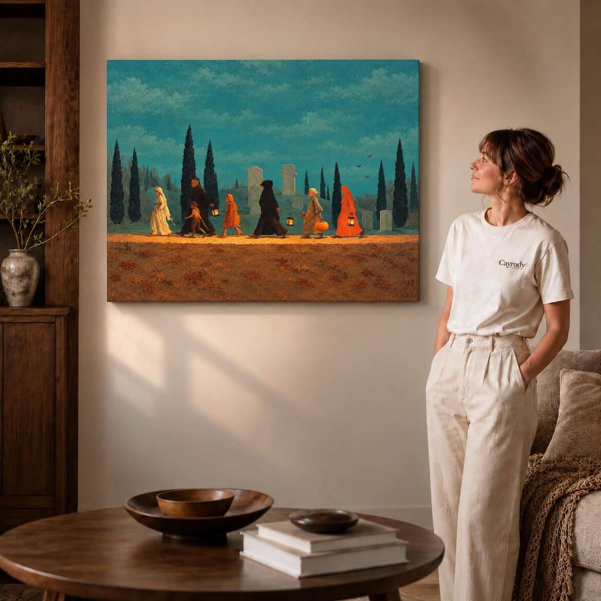 autumn lantern procession canvas art on gallery-wrapped canvas with visible edge depth beside a standing woman.