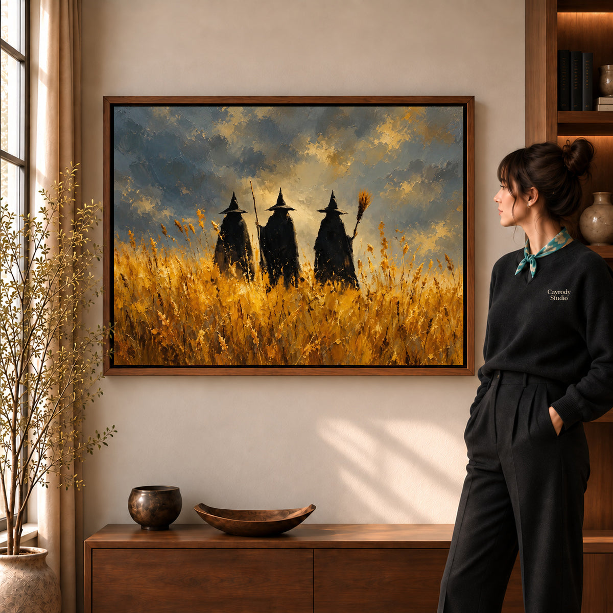 golden meadow witches canvas art shown in the walnut frame option within a warm living room.