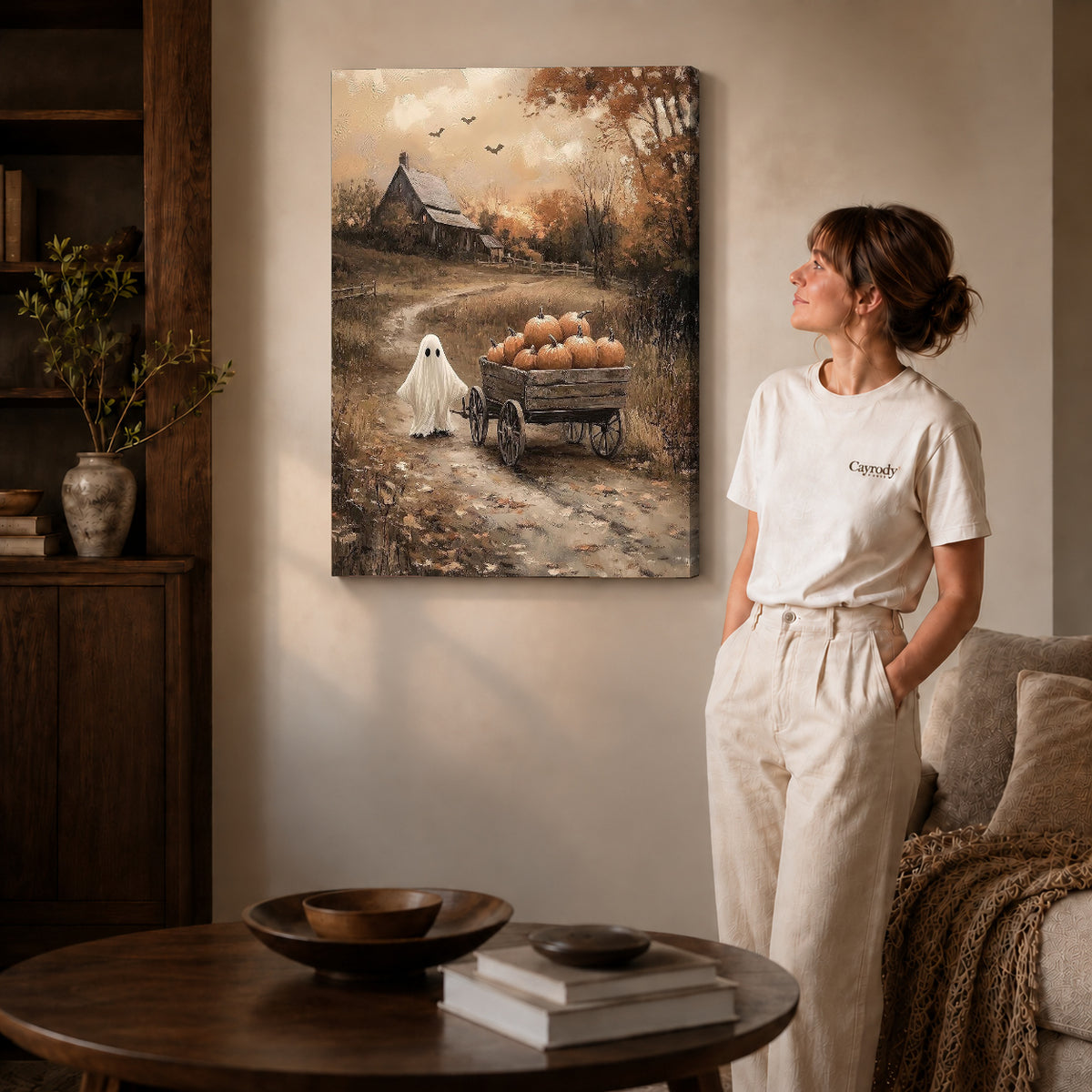 harvest wagon ghost canvas art on gallery-wrapped canvas with natural edge shading beside a standing woman.