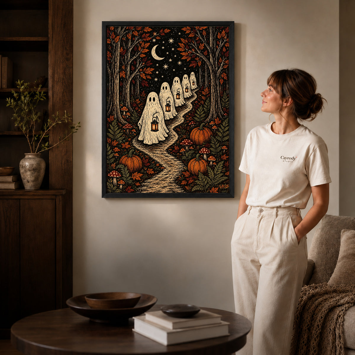 moonlit ghost lanterns canvas art shown in the black frame option against a softly lit wall.