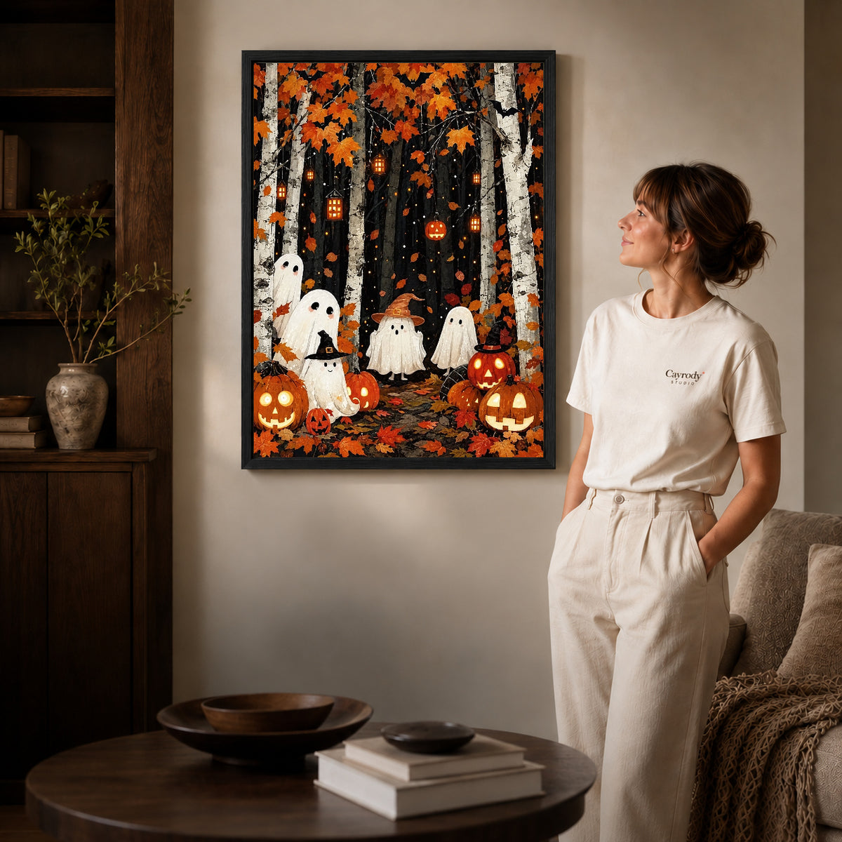 birch forest ghosts canvas art shown in the black frame option against a softly lit wall.