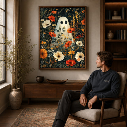 botanical ghost garden canvas art in a walnut frame above a console beside a seated man.
