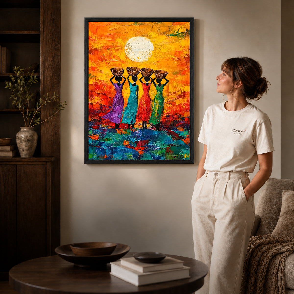 sunlit basket women canvas art shown in the black frame option against a softly lit wall.