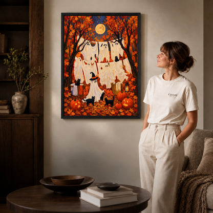 autumn ghost laundry canvas art in a black frame beside a woman and round wooden table.
