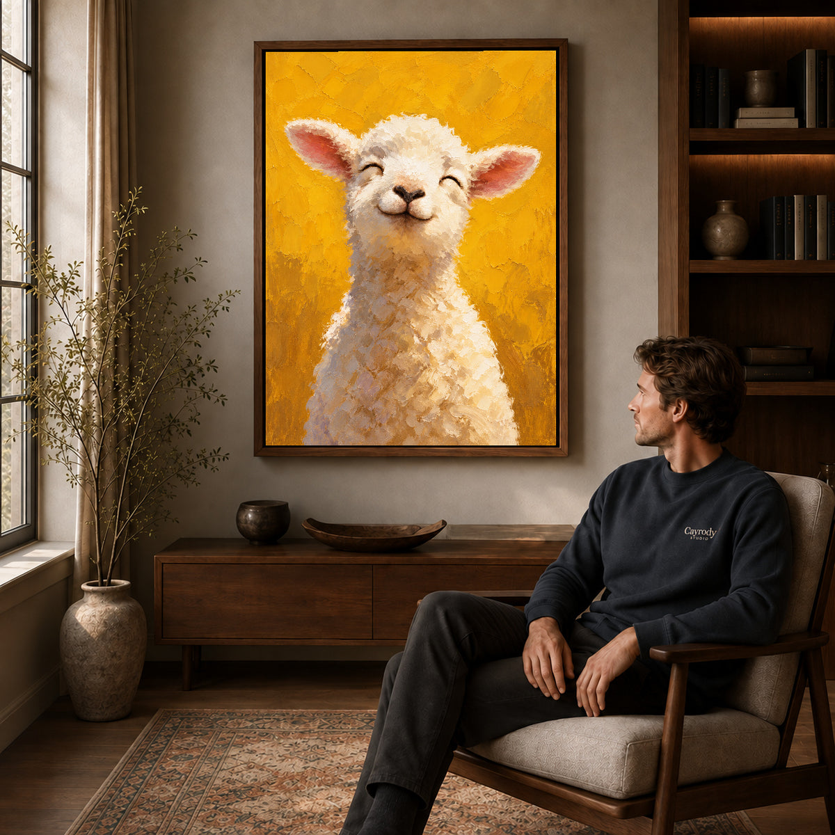 smiling golden lamb canvas art in a walnut frame above a console beside a seated man.