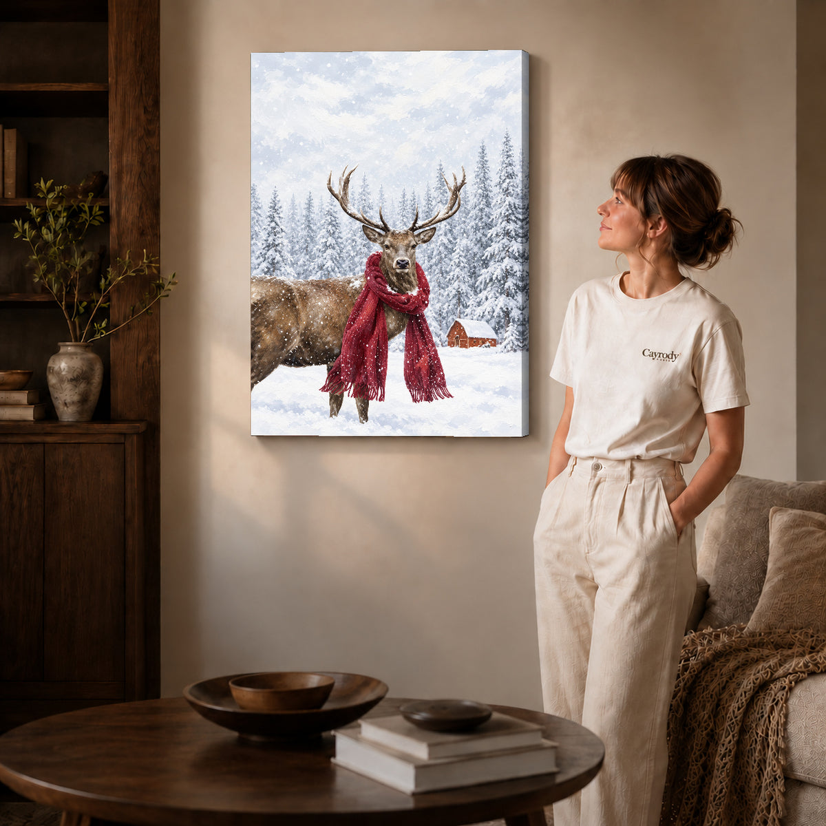 snowy scarf deer canvas art on gallery-wrapped canvas with natural edge shading beside a standing woman.