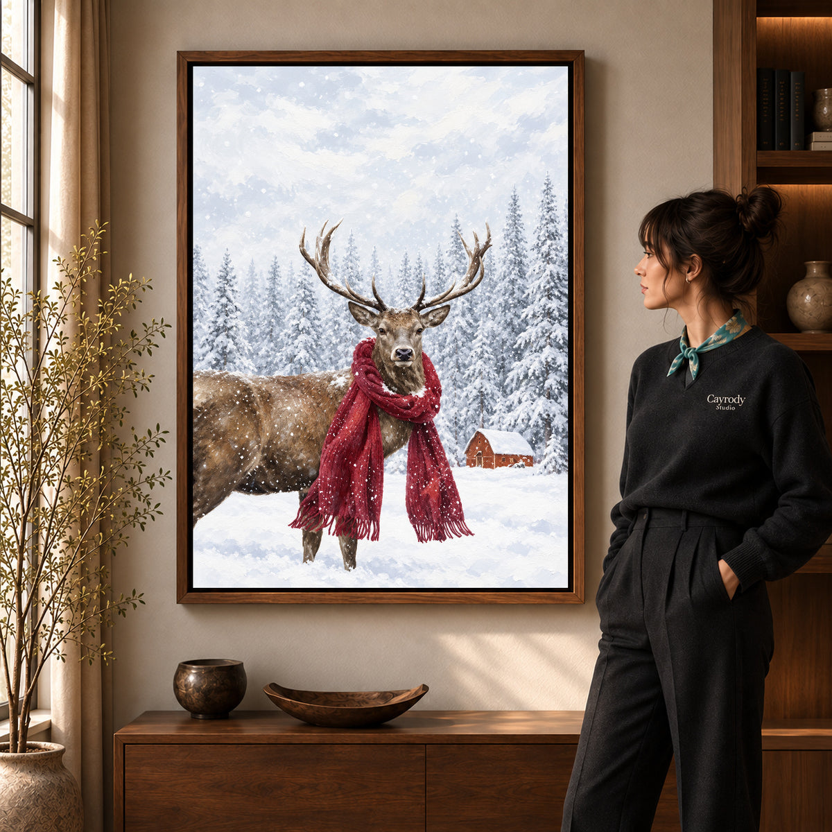 snowy scarf deer canvas art shown in the walnut frame option within a warm living room.