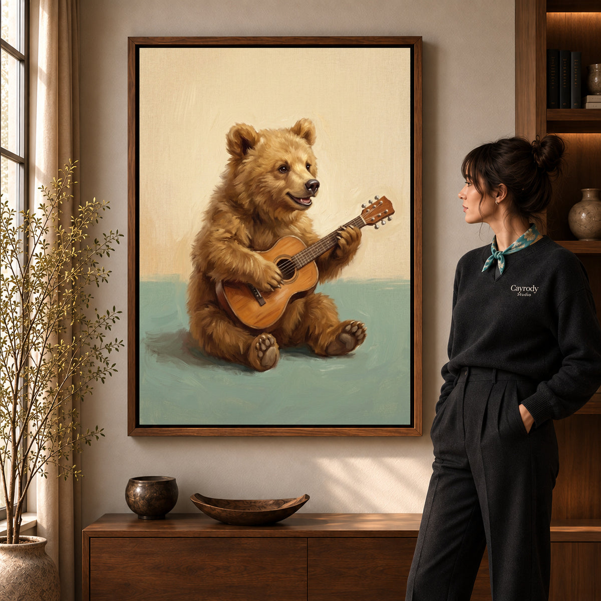 happy guitar bear canvas art shown in the walnut frame option within a warm living room.