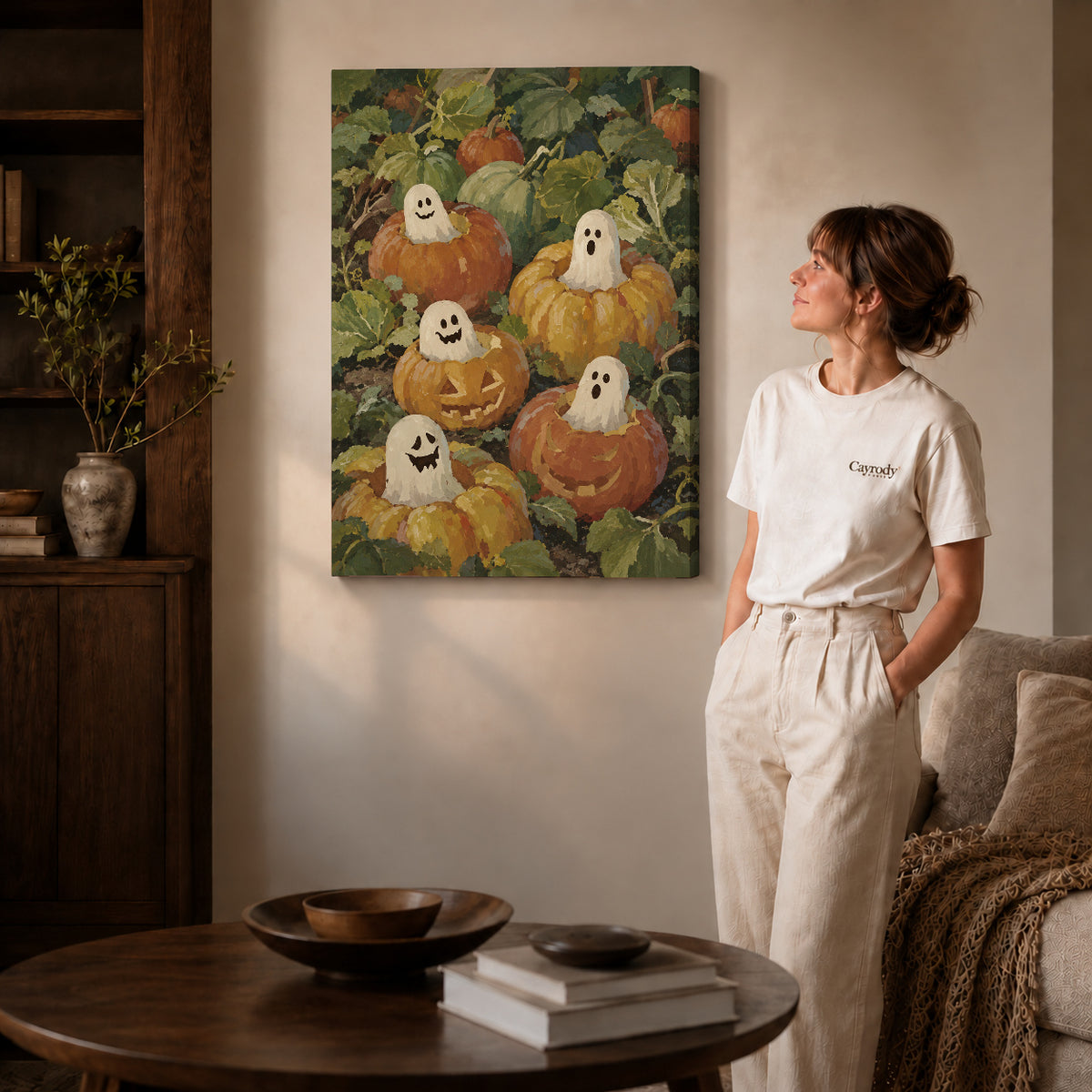 pumpkin ghost friends canvas art shown in the gallery-wrapped option with visible depth and warm surroundings.