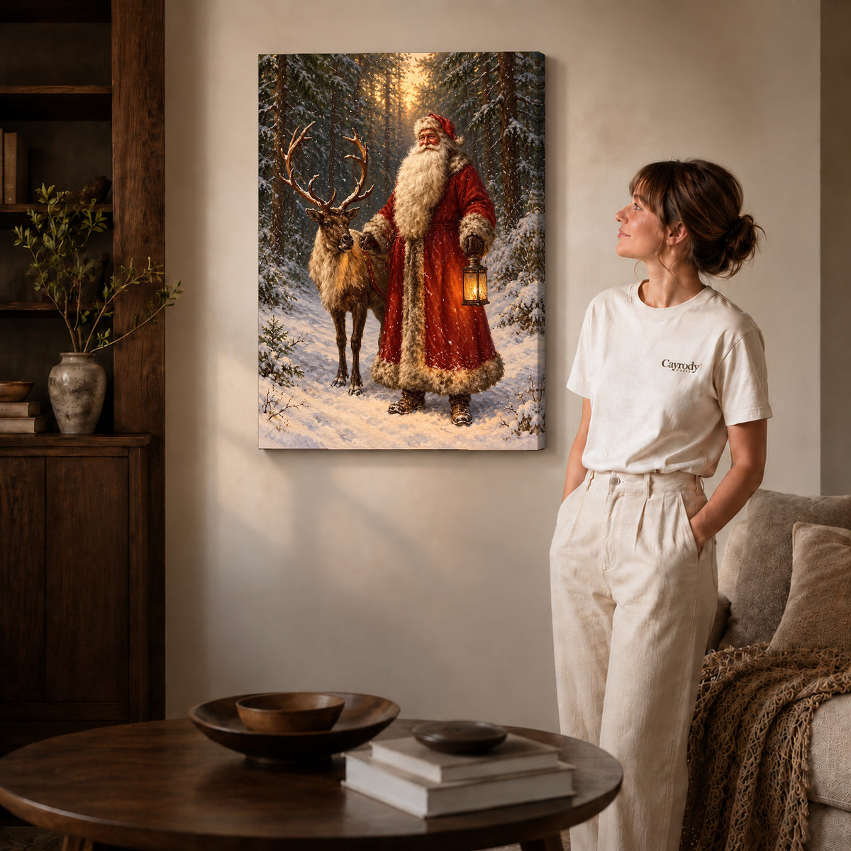 winter lantern santa canvas art on gallery-wrapped canvas with natural edge shading beside a standing woman.