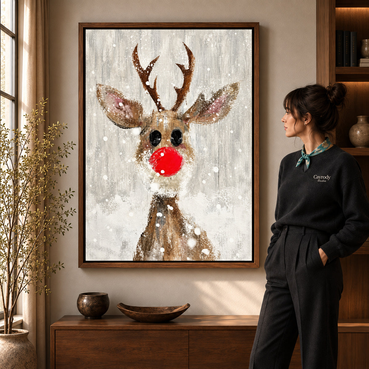 snowy red nose deer canvas art shown in the walnut frame option within a warm living room.