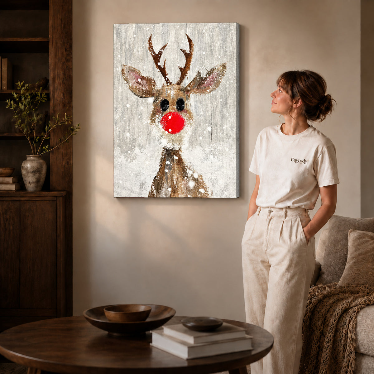 snowy red nose deer canvas art shown in the gallery-wrapped option with visible depth and warm surroundings.